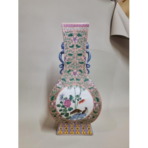 1690 - A large Chinese famille rose twin handled vase, Yongzheng six character mark to base, 44.5cm high.... 