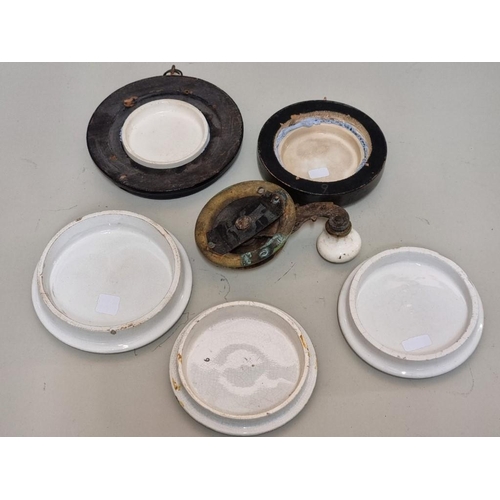 1712 - Pot Lids: a group of five shell examples; together with a similar bell handle. (6)