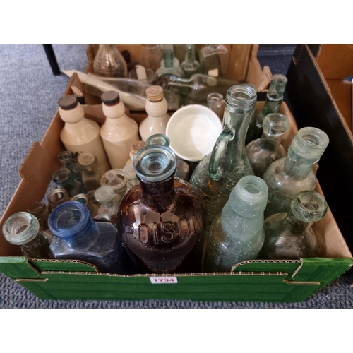 1734 - A large collection of old glass bottles and related. (three trays)