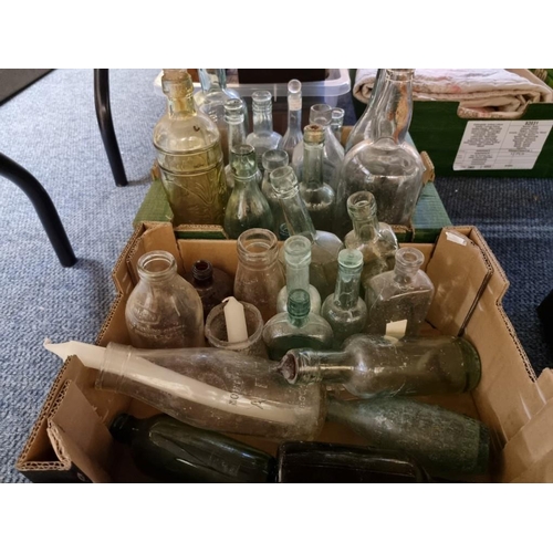 1734 - A large collection of old glass bottles and related. (three trays)