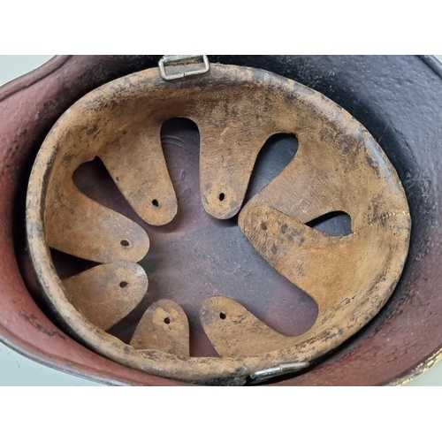 1760 - A German Third Reich M35 pattern steel helmet, bearing two decals, with liner.