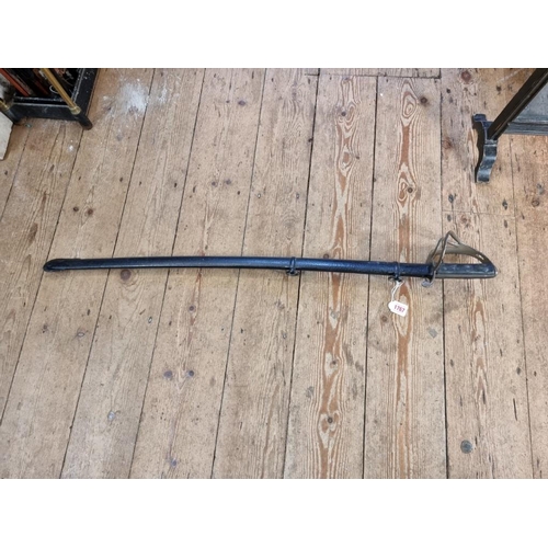 1767 - A British 1853 pattern cavalry trooper's sabre and steel scabbard, having 90cm fullered blade, stamp... 