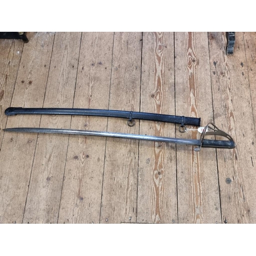 1767 - A British 1853 pattern cavalry trooper's sabre and steel scabbard, having 90cm fullered blade, stamp... 