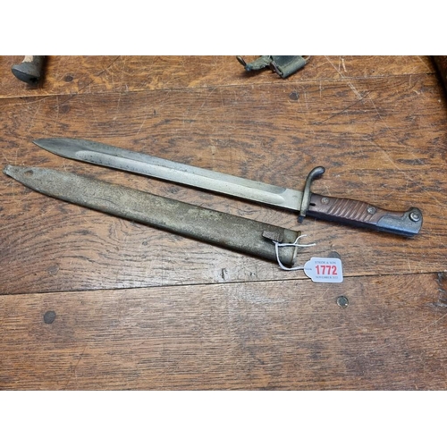 1772 - An Imperial German World War I 98/05 pattern 'Butcher' bayonet and scabbard, having 37cm blade stamp... 