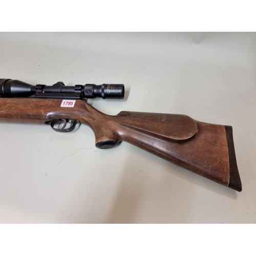 1795 - A Weihrauch HW77 .22  cal under lever air rifle, serial number 1022684, with an Optima 3.9 x 45 scop... 