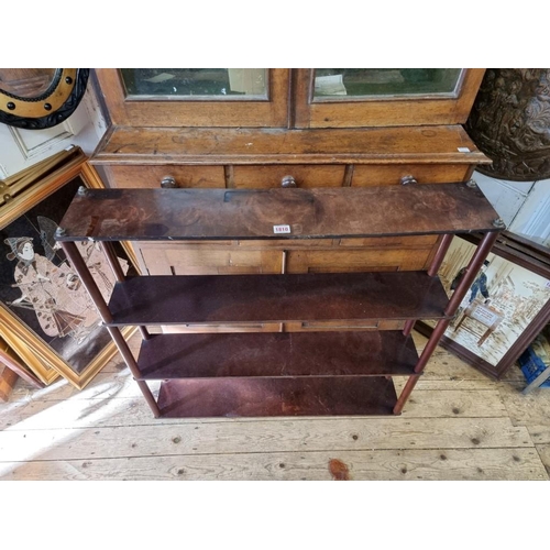 1810 - An unusual Bakelite four tier open stand, 85cm wide.