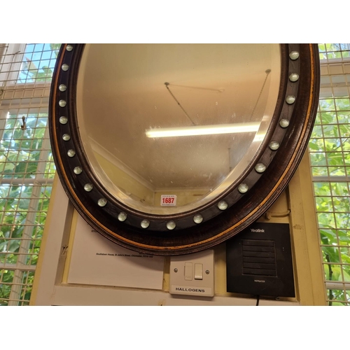 1687 - An Irish style oval wall mirror, 89 x 65cm.