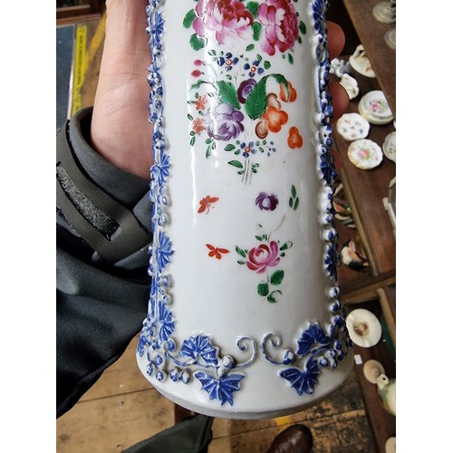 1554 - An unusual Chinese famille rose vase, 19th century, moulded in relief and decorated with squirrels. ... 