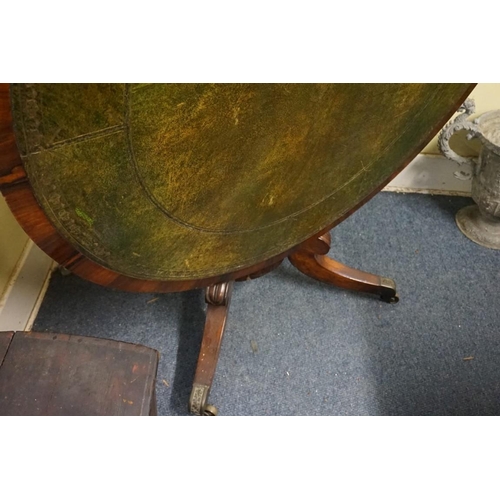 1177 - A 19th century rosewood and leather inset circular tilt-top table, 122cm diameter.... 