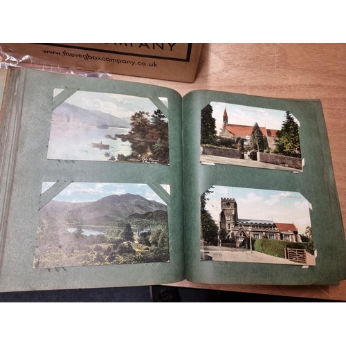 132 - POSTCARDS: three vintage albums of postcards, largely British topography, assembled by Henry Wi... 