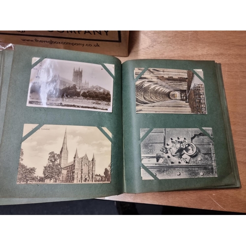 132 - POSTCARDS: three vintage albums of postcards, largely British topography, assembled by Henry Wi... 