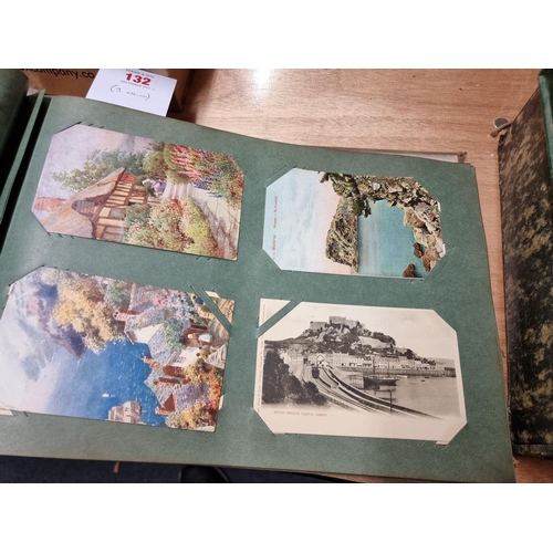 132 - POSTCARDS: three vintage albums of postcards, largely British topography, assembled by Henry Wi... 