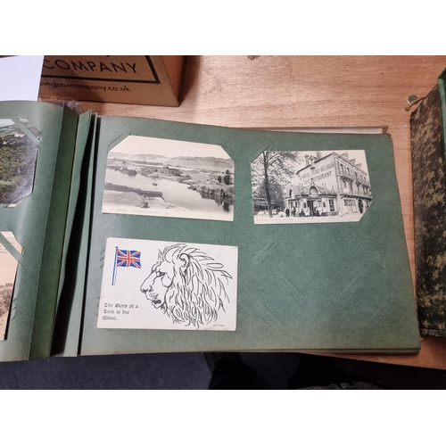 132 - POSTCARDS: three vintage albums of postcards, largely British topography, assembled by Henry Wi... 