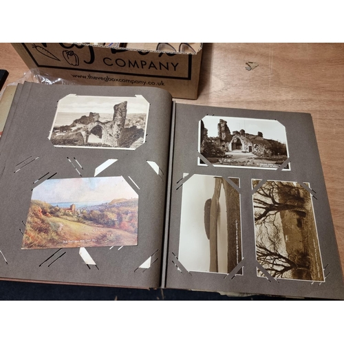 132 - POSTCARDS: three vintage albums of postcards, largely British topography, assembled by Henry Wi... 