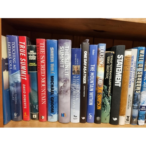 196 - MOUNTAINEERING: a collection of 61 mountaineering books across one shelf, largely hardback with... 