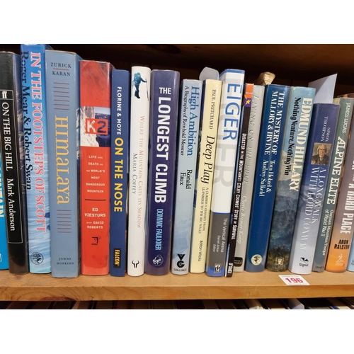 196 - MOUNTAINEERING: a collection of 61 mountaineering books across one shelf, largely hardback with... 