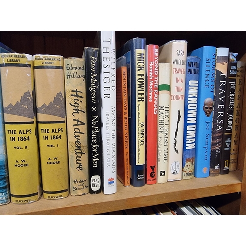 196 - MOUNTAINEERING: a collection of 61 mountaineering books across one shelf, largely hardback with... 