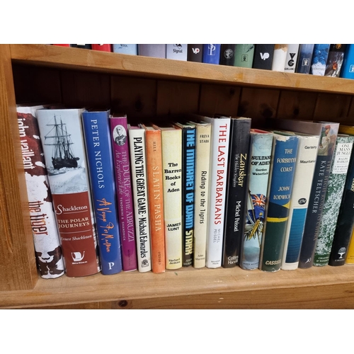 197 - TRAVEL/MOUNTAINEERING: a collection of 54 books across one shelf, mostly first editions in dustjacke... 