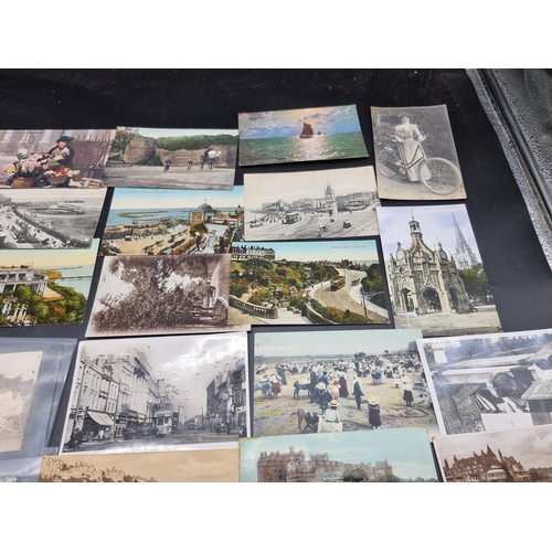 215 - POSTCARDS: a group of approx 150+ postcards, misc. subjects, to include RP view of HMS Suffolk ... 