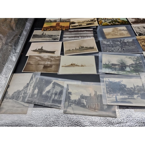 215 - POSTCARDS: a group of approx 150+ postcards, misc. subjects, to include RP view of HMS Suffolk ... 