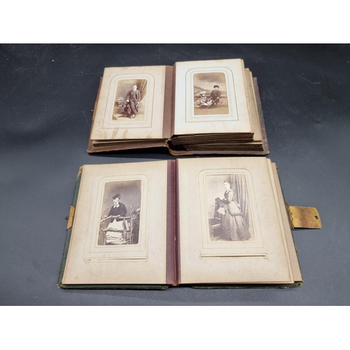 218 - CARTE DE VISITE: a collection in two small format albums of period. (2)