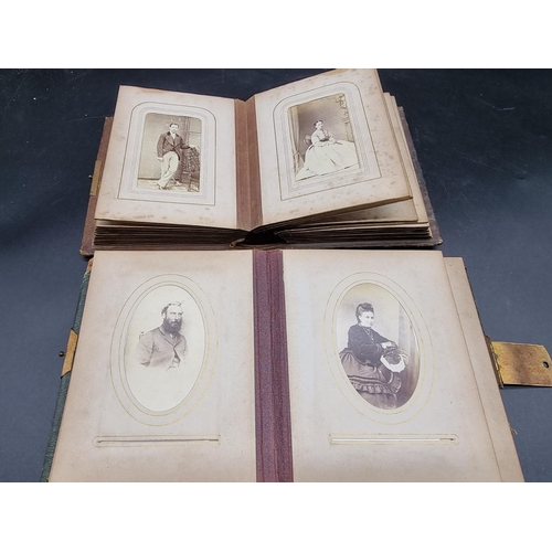 218 - CARTE DE VISITE: a collection in two small format albums of period. (2)