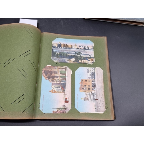 23 - MIDDLE EAST: early postcard album including views of Baghdad: plus a snapshot album containing ... 