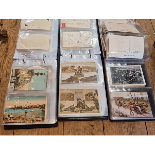 321 - POSTCARDS: a diverse collection housed in 3 modern albums, to include World War I: topography: comic... 