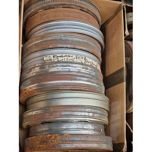 323 - FILM REELS: a large quantity of vintage film reels in metal tins, contained in 4 large boxes. (... 