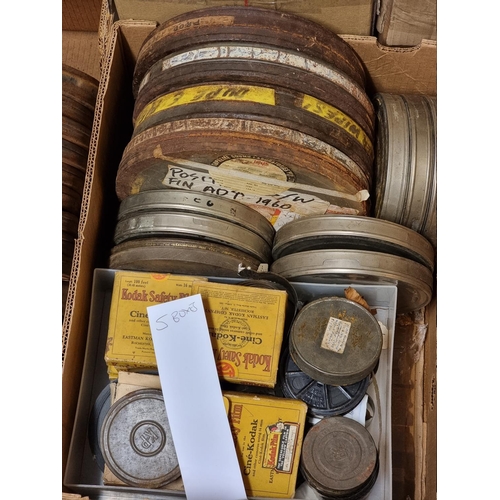 324 - FILM REELS: a large quantity of vintage film reels, many in metal tins, contained in 5 large boxes. ... 