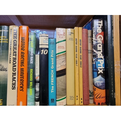 77 - MOTOR-RACING: a quantity of books over one shelf. (Approx 39 vols)