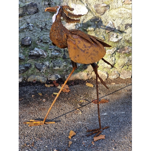 1002 - A lifesize steel peacock, approx 123cm; and another similar bird, 63cm high, (both oxidised). (2)... 