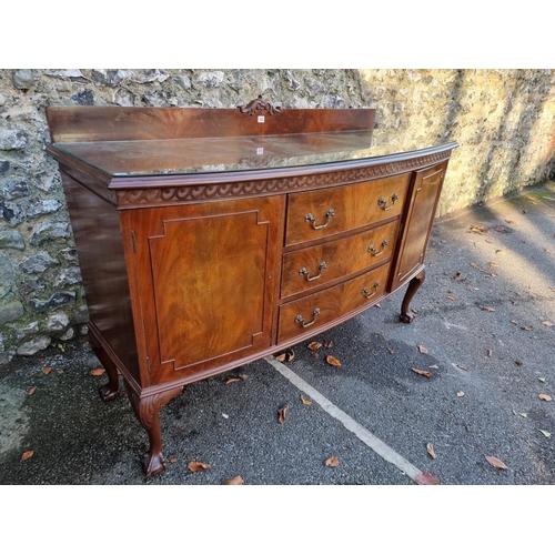 1003 - A 1920s mahogany bowfront sideboard, 153cm wide.