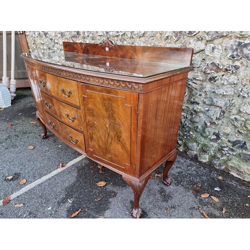 1003 - A 1920s mahogany bowfront sideboard, 153cm wide.