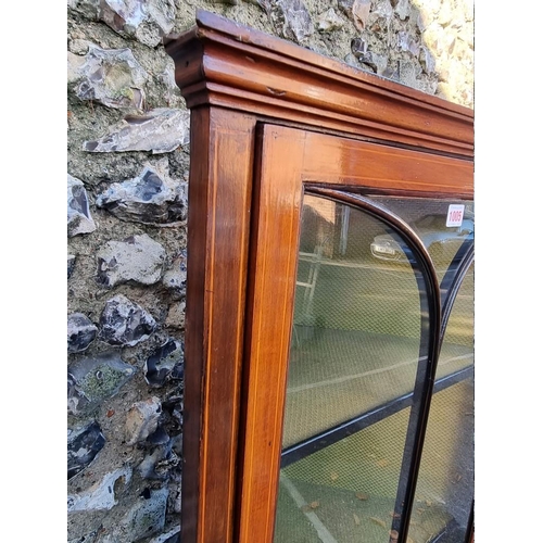 1005 - An Edwardian mahogany line inlaid standing corner cupboard, 161.5cm high x 56.5cm wide.... 