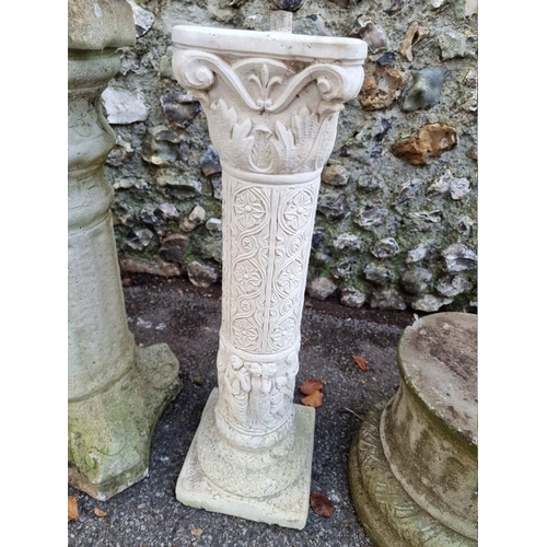 1012 - A small collection of composition stone pedestals and bird baths, (chips). ... 