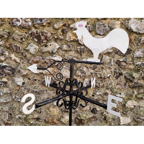 1019 - A black painted metal cockerel weather vane, 141cm high. ... 