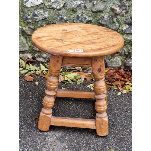 1027 - An old pine stool, 40cm high x 41cm wide. 