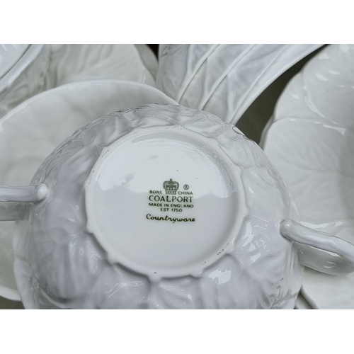 1032 - A large quantity of Coalport 'Countryside' tea and dinnerware. 