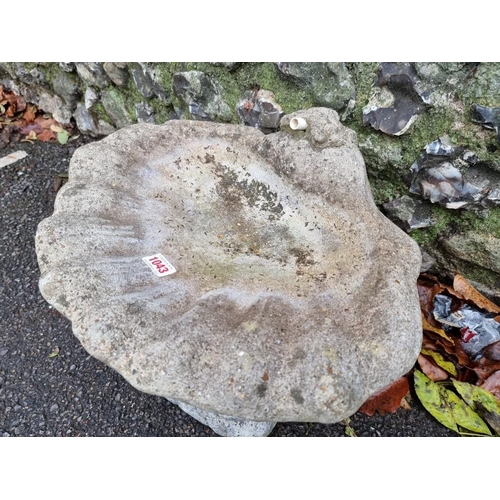 1043 - A reconstituted stone bird bath, 45cm wide. 