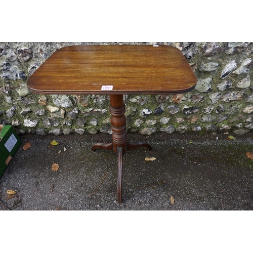 1051 - A 19th century tripod table, together with a mahogany bidet and liner.