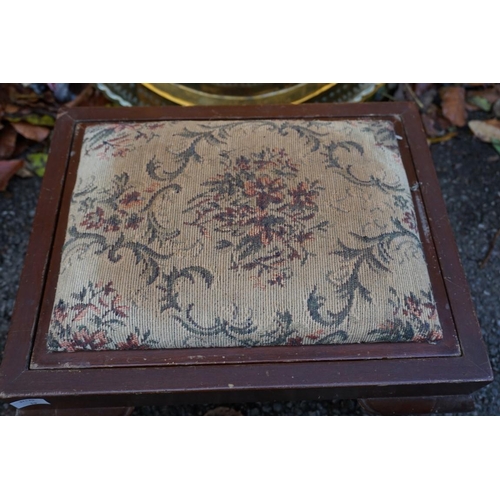 1052 - An eastern brass tray; together with a carved oriental footstool, with reversible top.... 