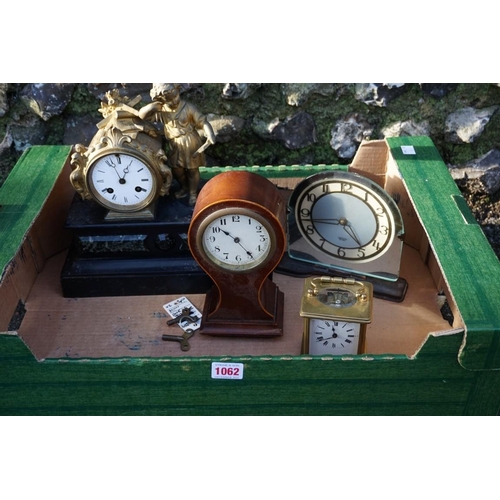 1062 - A Smith's Sectric mantel clock; together with a marble and slate mantel clock; a carriage clock; and... 