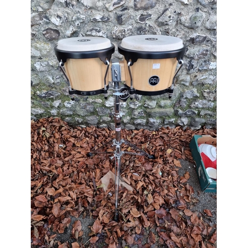 1069 - A pair of Meinl bongo drums. 