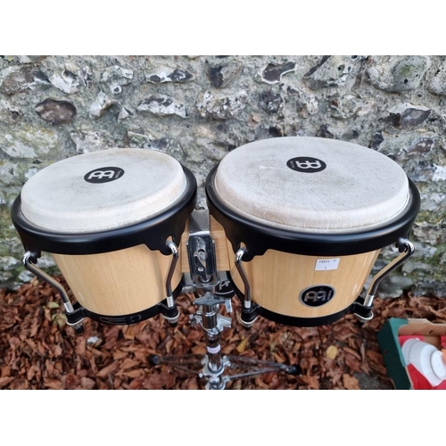 1069 - A pair of Meinl bongo drums. 