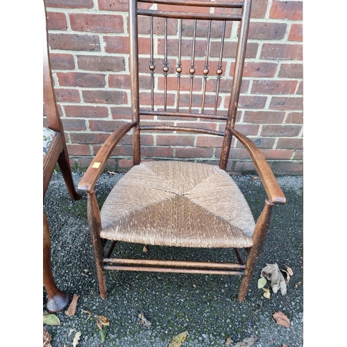 1073 - An antique mahogany dining chair, having tapestry set; together with an oak and cane seated chair. (... 