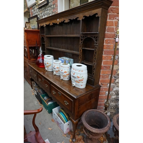 1090 - A George III oak dresser and rack, possibly Shropshire, 202cm wide. 