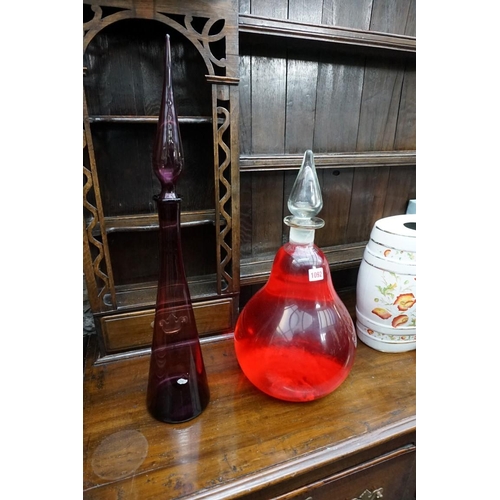 1092 - A large clear glass apothecary display bottle and stopper, 48.5cm high, (stopper glued in place); to... 