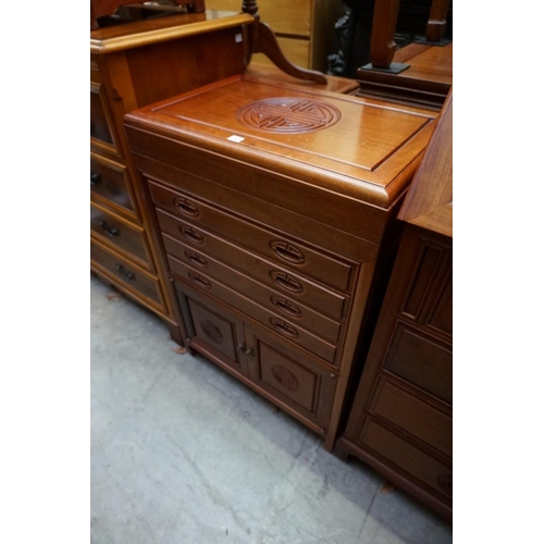 1097 - A Chinese hardwood side cabinet, 73.5cm wide; together with another matching cabinet, fitted for cut... 