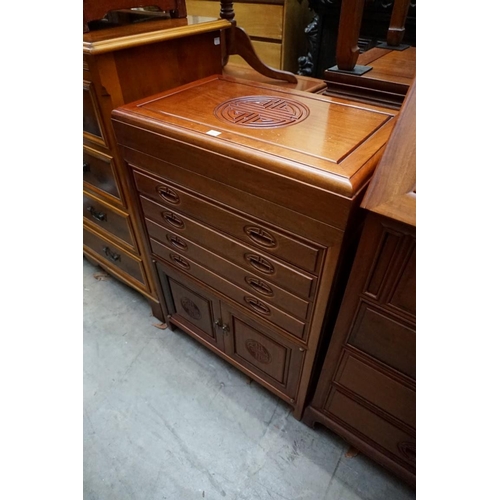 1097 - A Chinese hardwood side cabinet, 73.5cm wide; together with another matching cabinet, fitted for cut... 